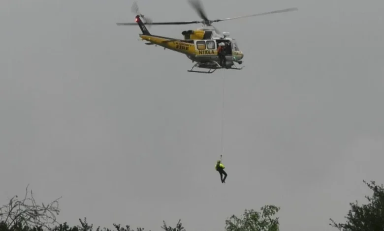 Woman rescued after she is swept nine miles in San Jose Creek during SoCal storm