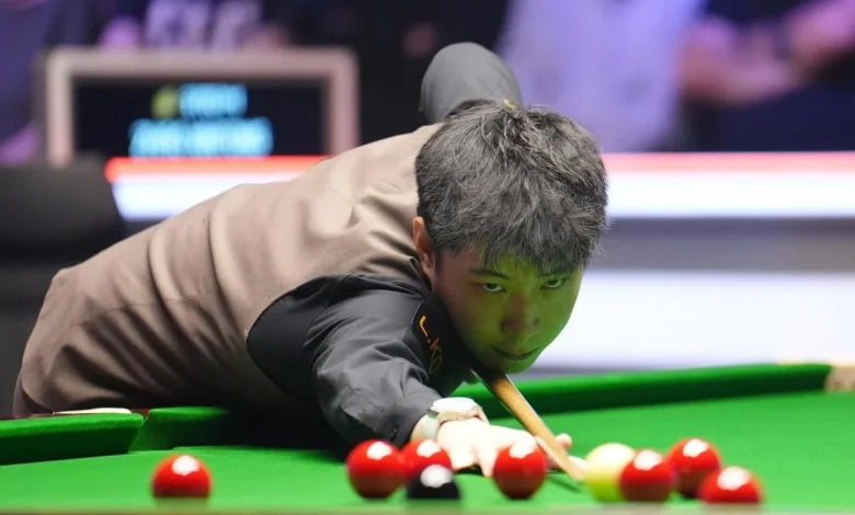 World Champion Zhao eases into UK Championship last 16