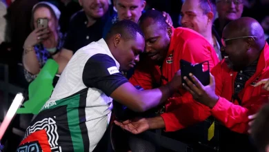 World Darts Championship: Veterinarian David Munyua stuns 18th seed Mike De Decker