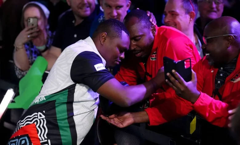 World Darts Championship: Veterinarian David Munyua stuns 18th seed Mike De Decker