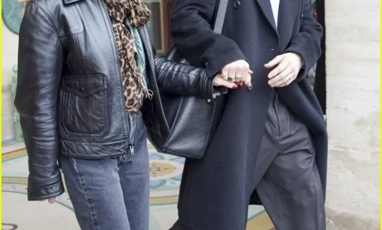 Aaron Taylor-Johnson & Wife Sam Hold Hands as They Check Out of Paris Hotel