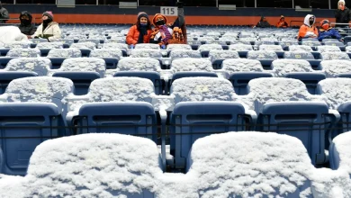 Arctic cold, snow at Denver Broncos playoff game