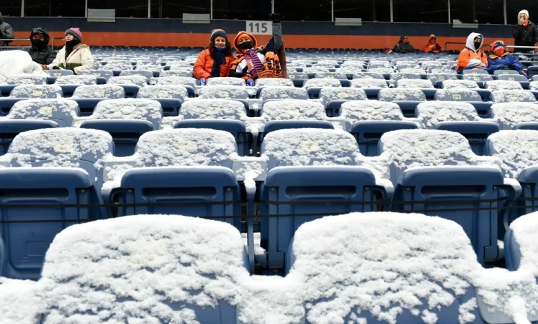 Arctic cold, snow at Denver Broncos playoff game