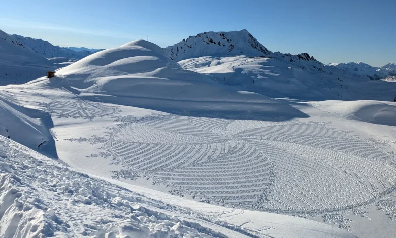 Artist draws vast, intricate designs on snow, then watches them vanish