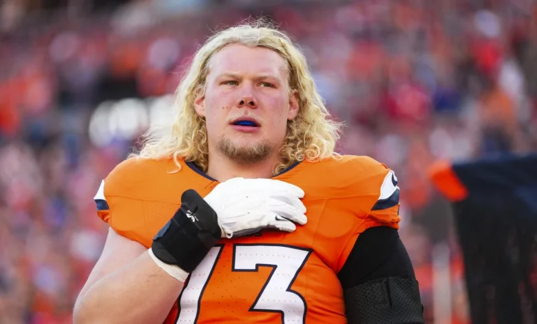 Broncos offensive lineman Frank Crum catches his first career pass, for a touchdown