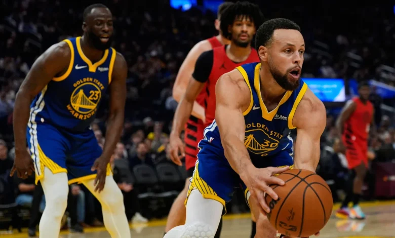 Butler, Curry help Warriors run away from Trail Blazers for win