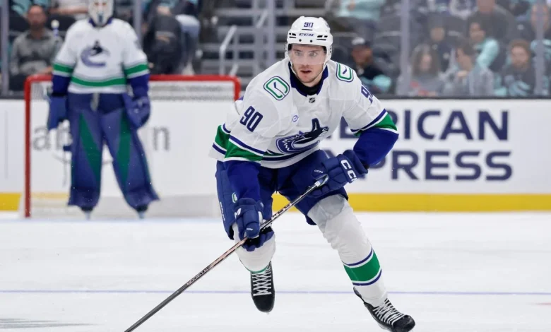 Canucks recall D Mancini and G Tolopilo, send D Elias Pettersson to AHL