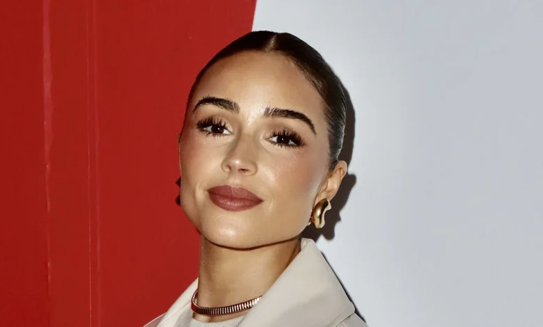 Christian McCaffrey’s wife Olivia turns heads in full-length 49ers coat for Seahawks