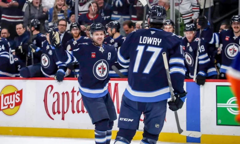 Connor, Lowry each has 2 points, Jets recover to defeat Islanders