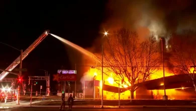 Crews battling large fire at former Carl's Jr. location near Fresno City College