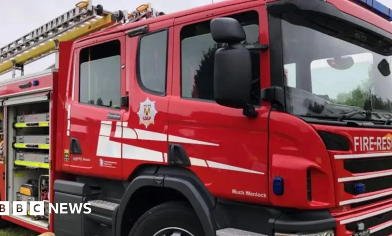 Dozens of firefighters tackle large house fire