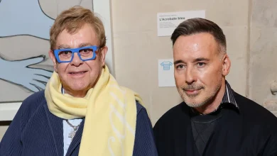 Elton John & David Furnish Make Rare Public Appearance at Jacquemus Paris Fashion Week Show