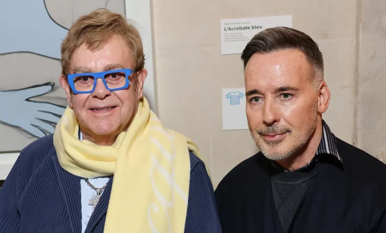Elton John & David Furnish Make Rare Public Appearance at Jacquemus Paris Fashion Week Show