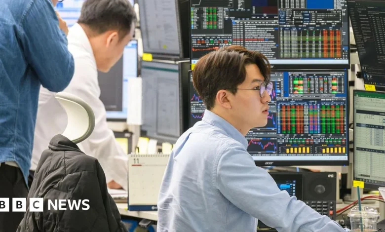 FTSE 100 index hits 10,000 milestone in new year rally