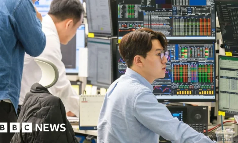 FTSE 100 index hits 10,000 milestone in new year rally