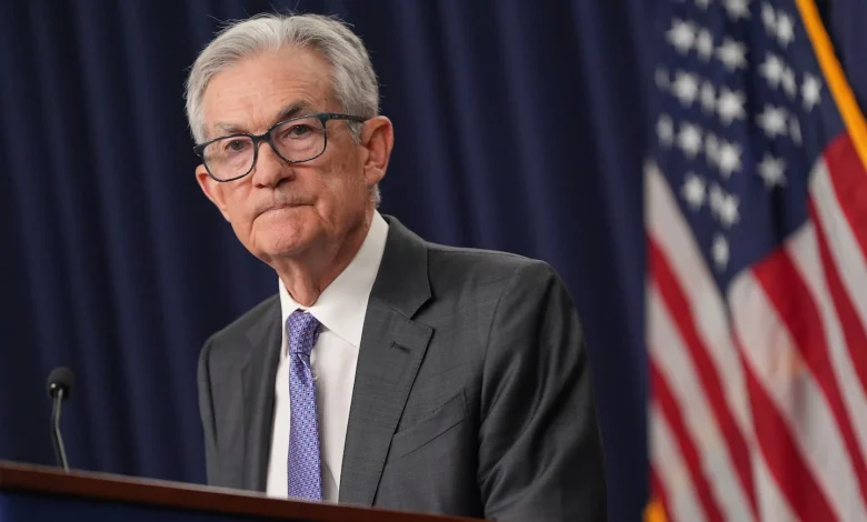 Fed holds rates steady as inflation remains elevated