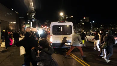 Federal vehicle knocks down protester during Renee Good vigil