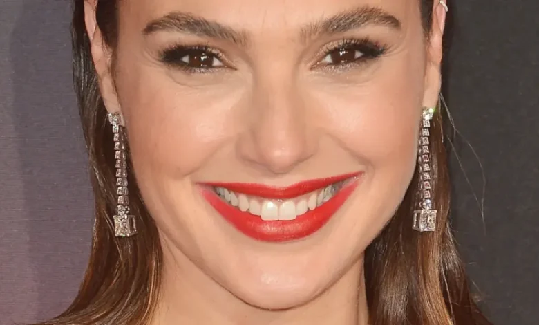 Gal Gadot In Skimpy Wet Swimsuit Highlights 'Million-Dollar Smile'