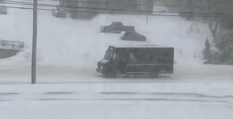 Heavy Snowfall Closes Businesses, Makes Driving Tricky