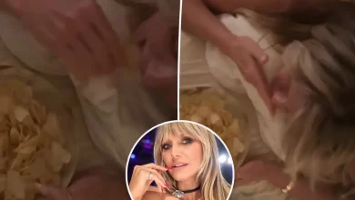 Heidi Klum gets cheeky butt massage while shamelessly chowing down on chips