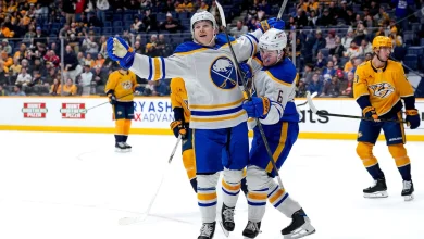 Helenius gets 1st 3 NHL points, Sabres hold off Predators