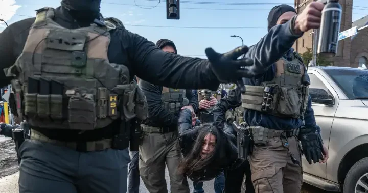 ICE agents pull woman from car as she yells ‘I’m disabled!’ in Minneapolis - National