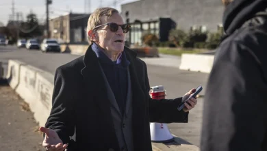 ICE officer charged with attacking immigrant rights activist in Chicago suburb