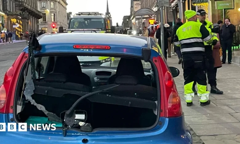 Man arrested after car crashes into scaffolding in Edinburgh