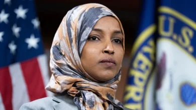 Man lunges at Ilhan Omar during town hall and tries to spray her with unknown substance