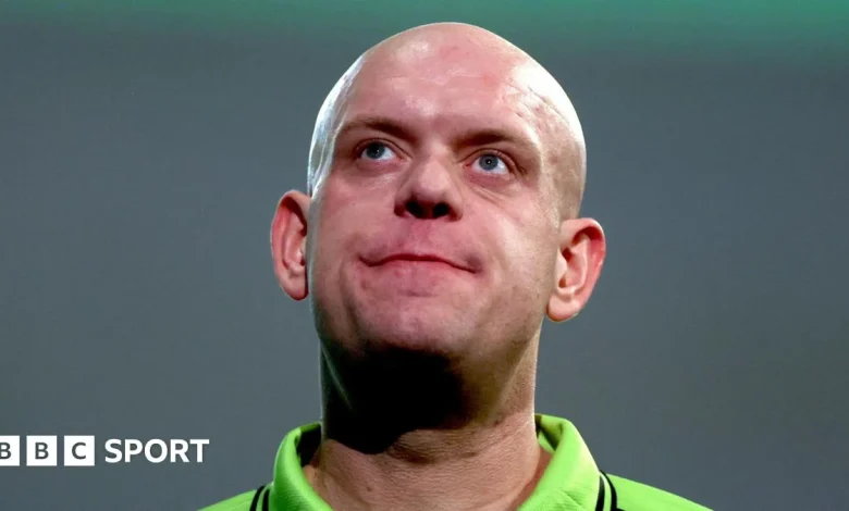 Michael van Gerwen loses to Damon Heta on day one of World Masters