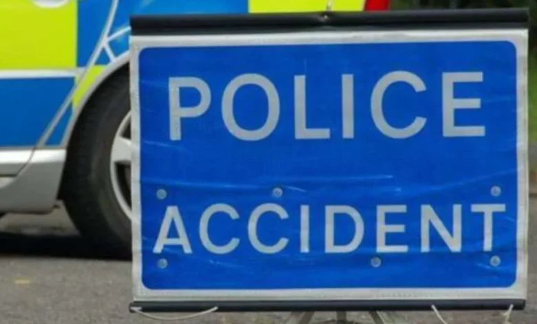 Motorway closed after car and motorbike crash