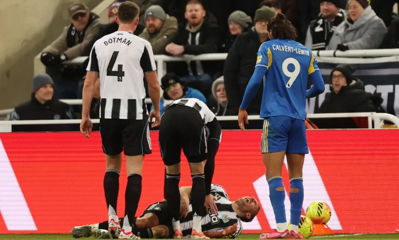 Newcastle star Fabian Schar stretchered off in distress with leg in brace during Leeds clash