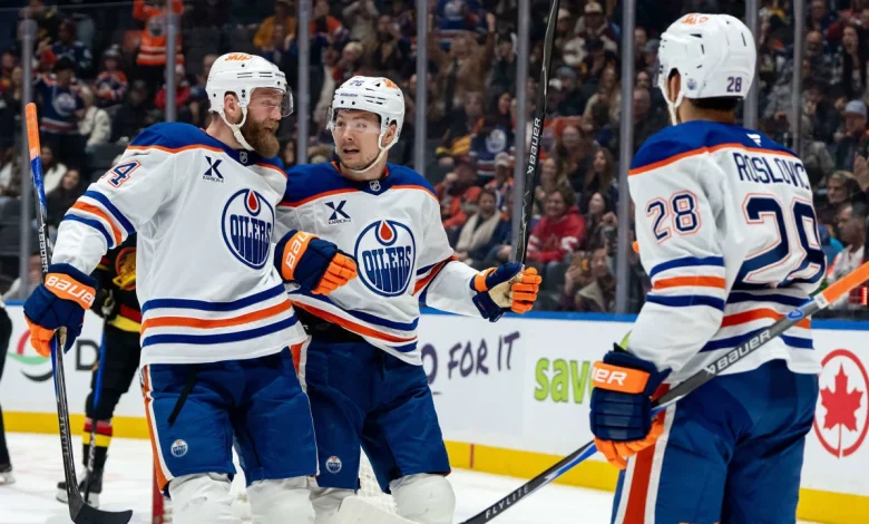 Oilers score 6 goals in 2nd, shut out Canucks