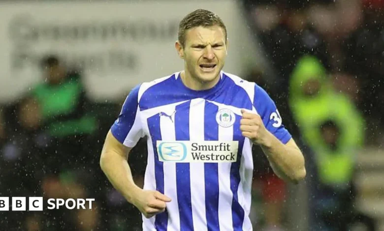 Paul Mullin: Striker returns to Wrexham as Wigan Athletic loan cut short