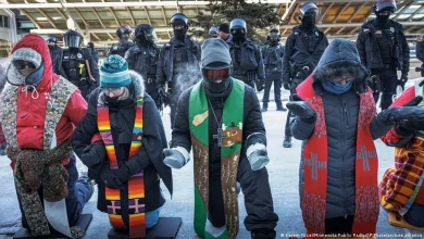 Police arrest clergy members amid ICE protests