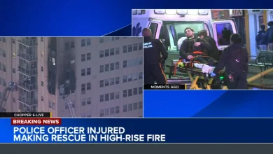 Police officer injured while making rescue during residential high-rise building fire in Atlantic City, New Jersey