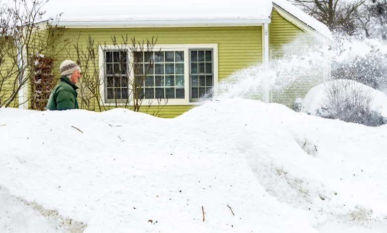 Pummeled by over a foot of snow, Mass. residents brace for more