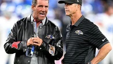 Report: Ravens owner fired Harbaugh over the phone