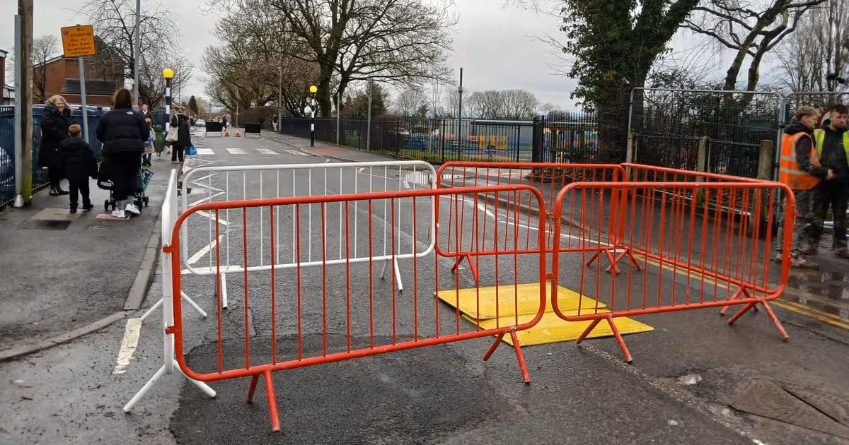 Road closed as workers spend second day at scene of Bolton sinkhole