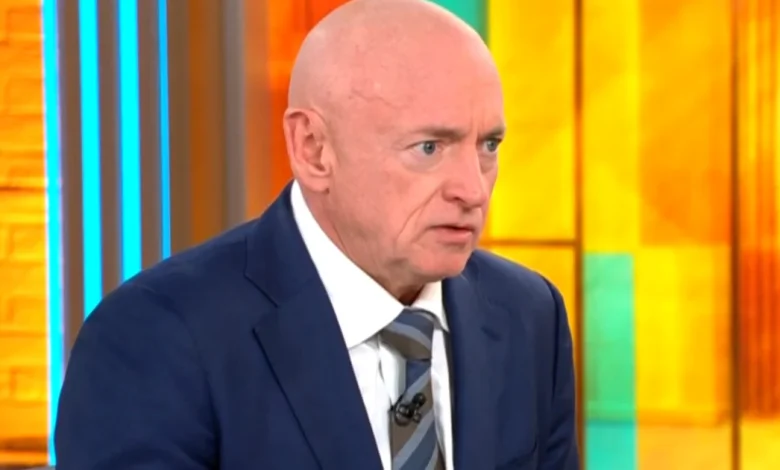 Sen. Mark Kelly says Hegseth's move to demote him "is about stifling people's speech"