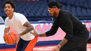 Syracuse legend Carmelo Anthony, son Kiyan have the coolest pregame routine