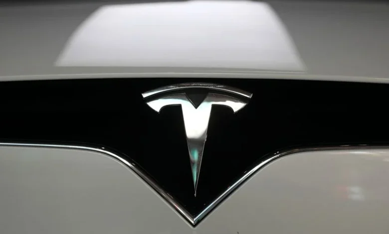 Tesla's quarterly deliveries fall more than expected on lower EV demand