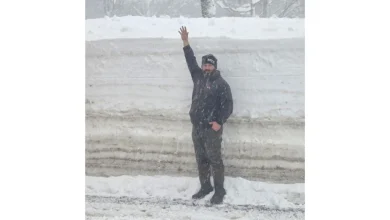 The story behind a snapshot of a state DOT worker and a nearly 8-foot snowbank that went viral
