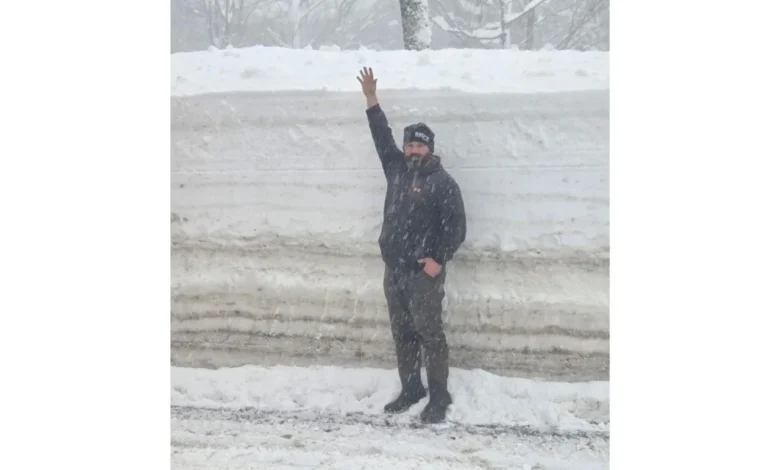 The story behind a snapshot of a state DOT worker and a nearly 8-foot snowbank that went viral