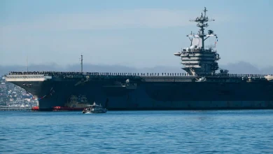 Trump says "armada" of warships is headed toward Iran "just in case"