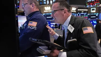 US stocks rise as gold hits another record and the dollar's value falls