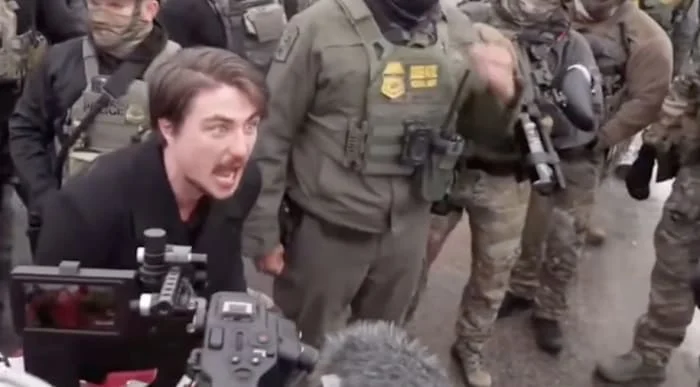 Viral video shows Michigan CEO shouting at protestors