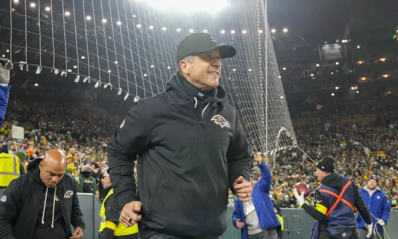 Which team with a coach currently in place called about John Harbaugh?