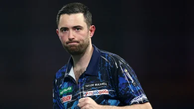 World Darts Championship: Luke Humphries reaches quarter-finals as Gary Anderson thrashes Michael van Gerwen at Alexandra Palace