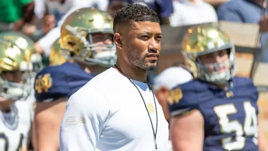 Wrestling coach accuses Notre Dame football coach Marcus Freeman of battery